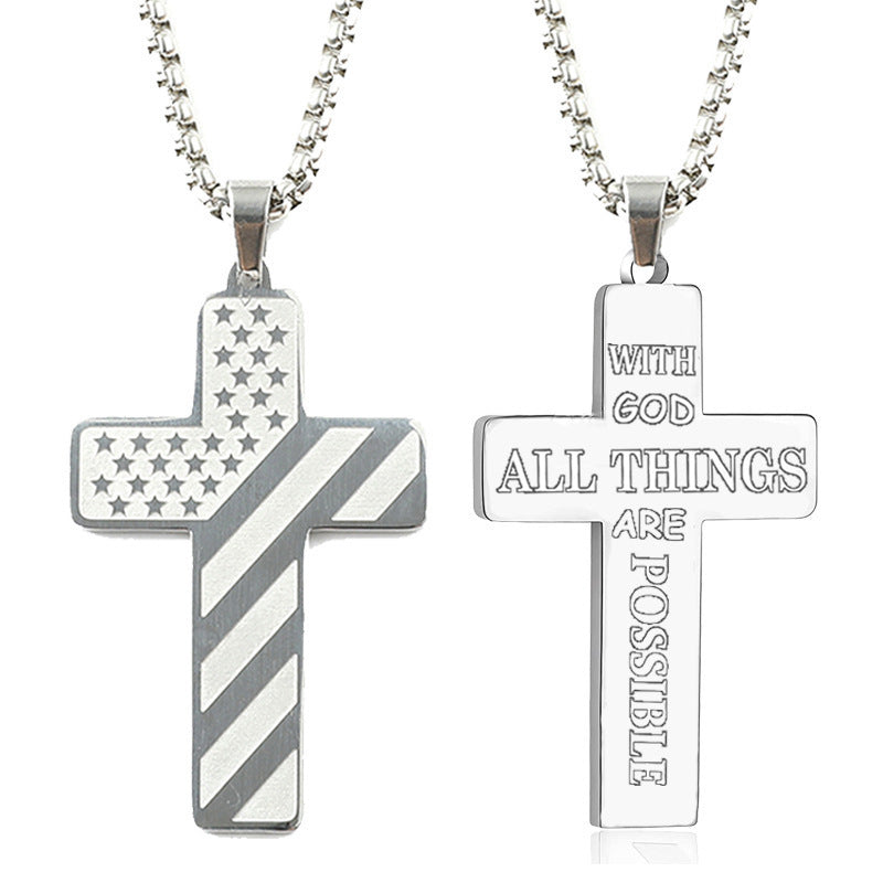 Silver-tone titanium steel cross necklace. One side features a US flag pattern; the other, engraved religious text.