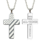 Silver-tone titanium steel cross necklace. One side features a US flag pattern; the other, engraved religious text.
