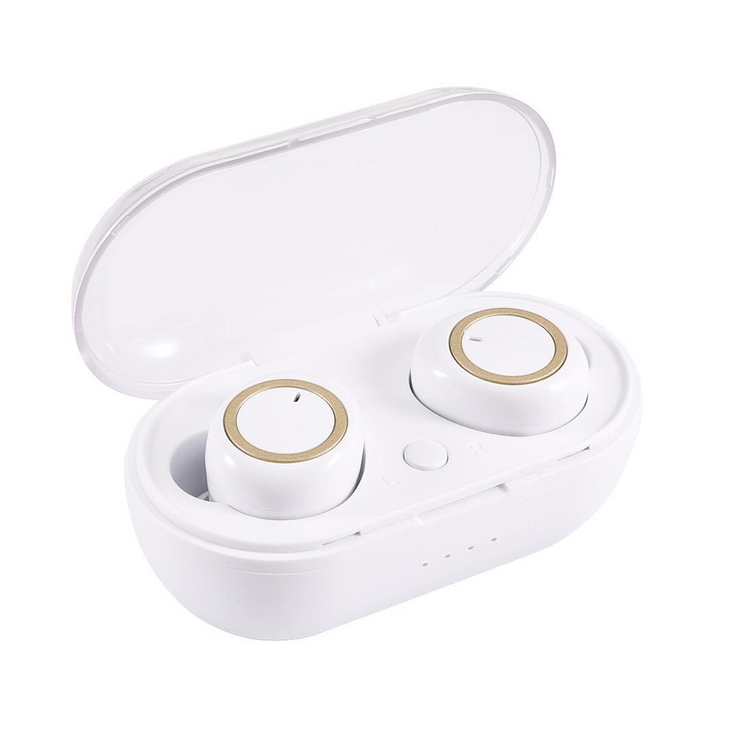 White Digitaldistribution375 wireless in-ear headphones in an open, white charging case with gold circular accents.
