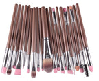 A 20-piece makeup brush set with metallic brown handles, silver ferrules, and soft synthetic pink and brown bristles.
