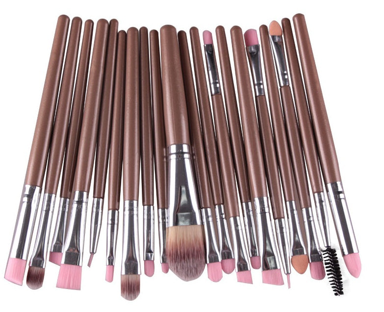 A 20-piece makeup brush set with metallic brown handles, silver ferrules, and soft synthetic pink and brown bristles.