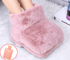 Feet inside a plush, dusty-pink faux fur electric foot warmer with an inset image of a small hot water bottle.