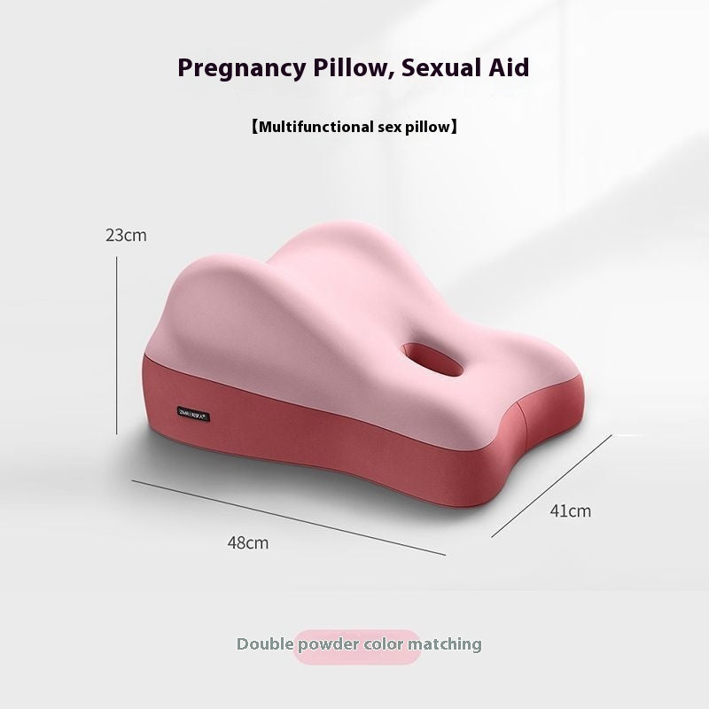 Contoured two-tone pink foam pillow with a center cutout, measuring 48x41x23cm for support and comfort.