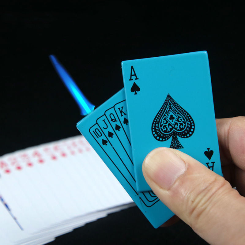 Blue playing card-shaped windproof electronic lighter producing a blue jet flame, held in a hand against black.