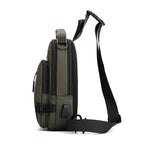Olive green, water-resistant tactical crossbody bag with black zippers, USB port, and padded mesh back panel.