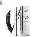 M.N Lash Power mascara tube and silver box next to a black mascara wand swipe on a white background.