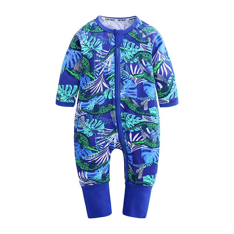 Blue cotton baby onesie featuring a tropical leaf and crocodile print, long sleeves, and a full-length front zipper.