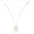 Clear, manual baby nasal aspirator with two transparent tubes attached to a small, round, cream-colored base.