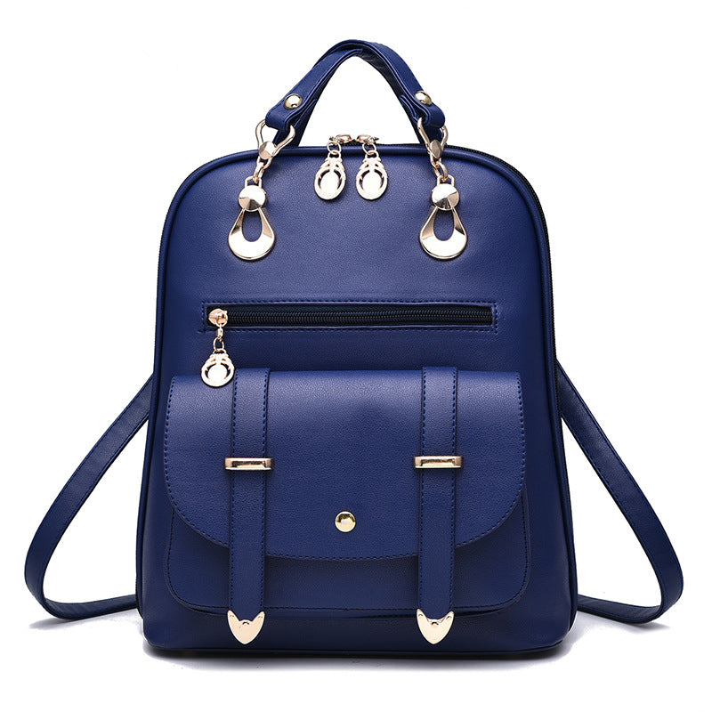 Blue PU leather dual-use backpack by Digitaldistribution375 featuring gold-tone hardware, top handle, and flap pocket.