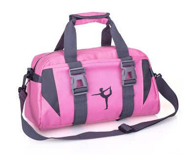 Pink yoga gym bag with gray trim, shoulder strap, top handles, two plastic buckle straps, and a yoga pose graphic.