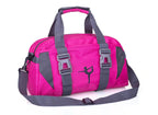 Hot pink yoga gym bag with gray straps, buckles, and a black dancer silhouette graphic on the front.
