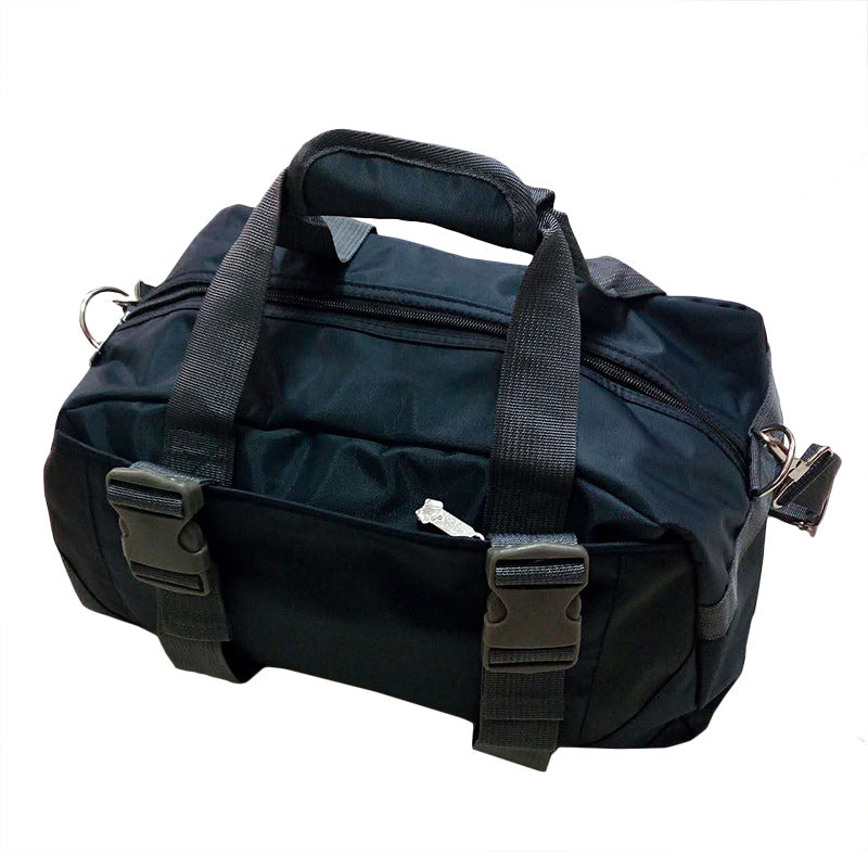 Black nylon yoga gym bag with dual top handles, zippered closure, and two adjustable front buckle straps.