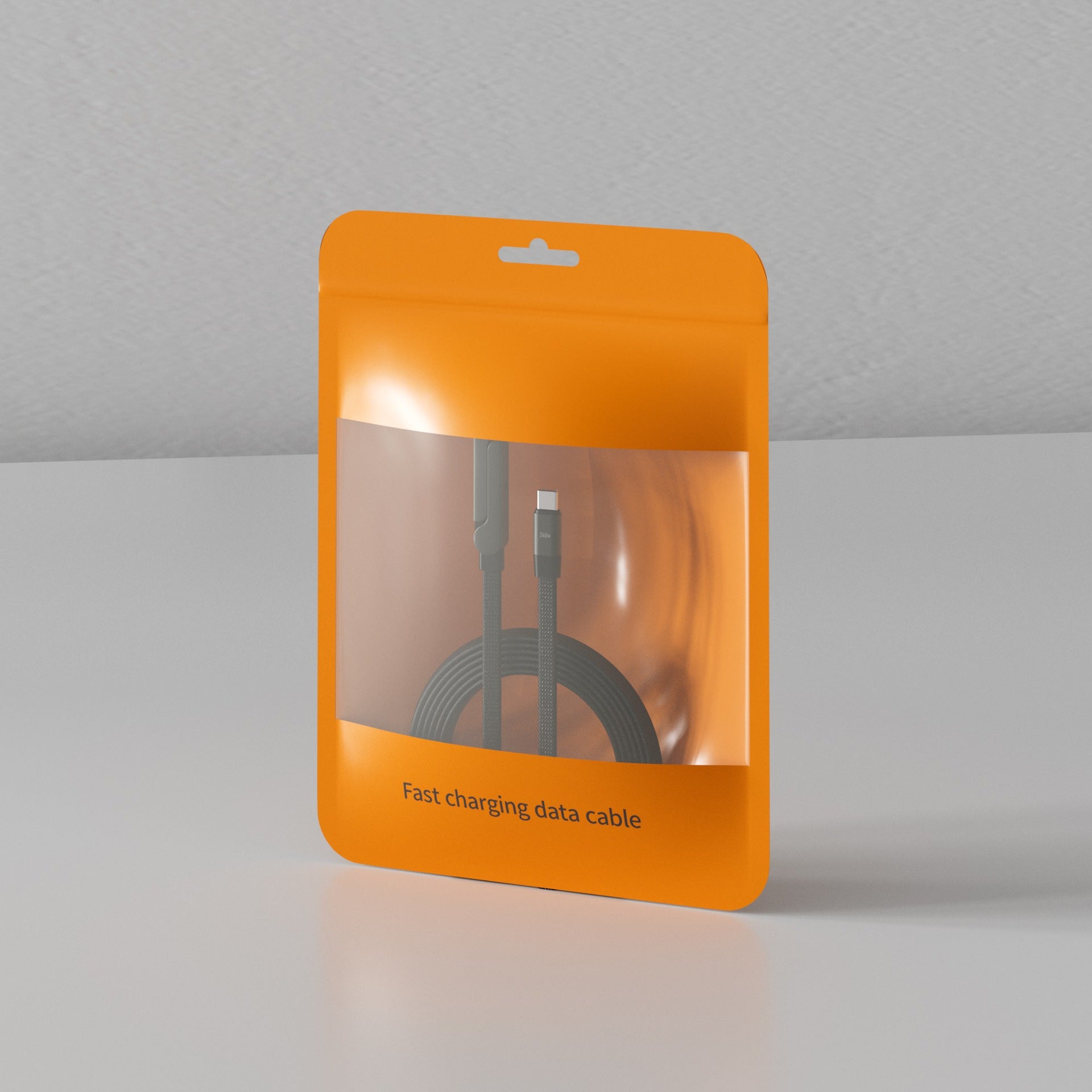 Black braided fast-charging data cable in an orange plastic pouch with a clear window. Includes a foldable bracket.