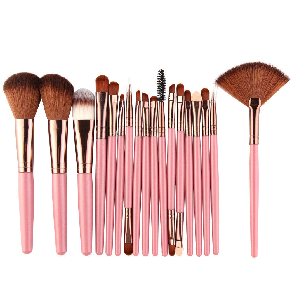 A 20-piece makeup brush set with soft brown bristles, rose gold ferrules, and pastel pink handles on a white background.