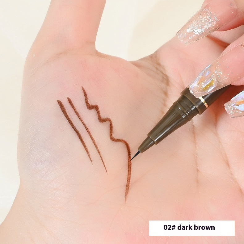 Hand holding dark brown liquid eyeliner pen drawing precise, smooth, smear-proof lines on skin.