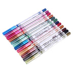 A set of 12 colorful glitter eye and lip liner pencils with white bodies, arranged diagonally on a white background.