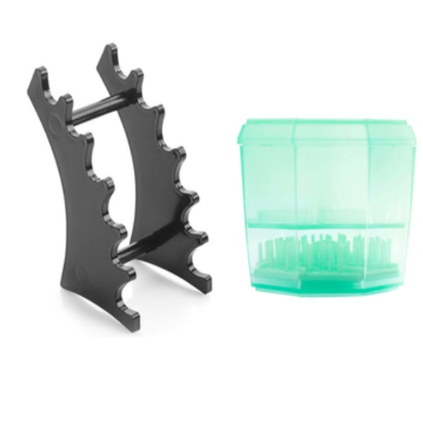 Black plastic makeup brush drying rack and a translucent green silicone brush cleaning cup on a white background.