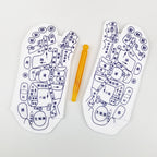 Two white reflexology socks featuring blue acupressure point charts and a yellow plastic massage tool on white background.