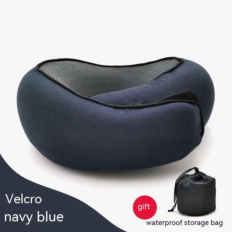 Navy blue cervical neck pillow with black mesh, Velcro closure, and a matching black waterproof storage bag gift.
