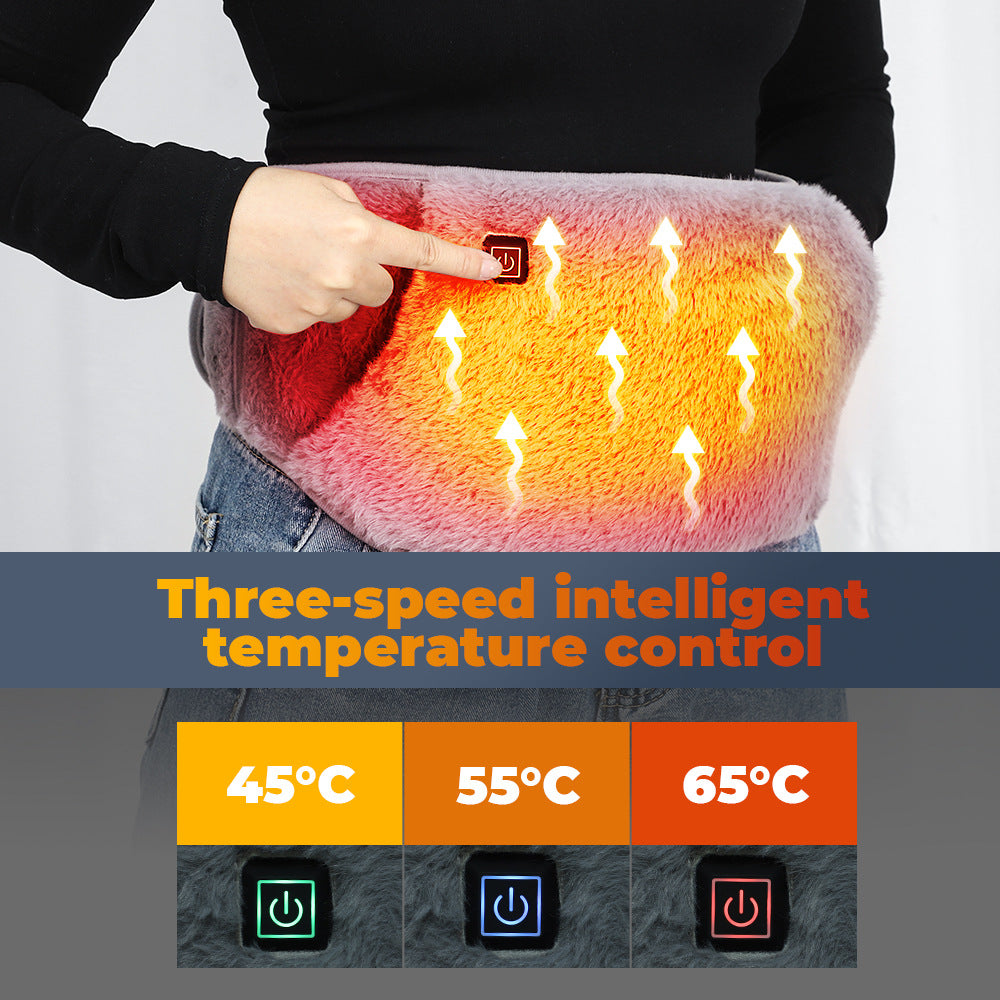 A fuzzy pink electric stomach heating belt with a three-speed temperature control button and heat indicator icons.