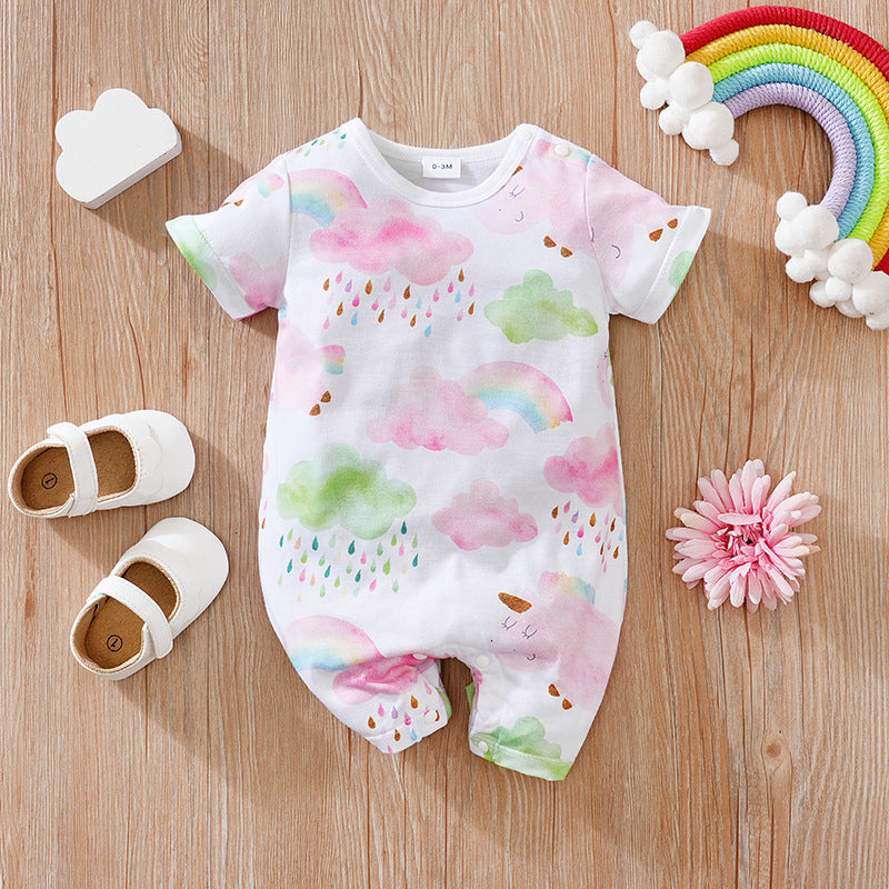 White baby romper with watercolor rainbow, cloud, and raindrop print, featuring short sleeves and snap-button closure.