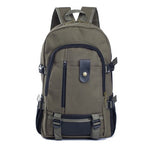 Olive green canvas men’s backpack with black trim, multiple zippered pockets, adjustable side straps, and top handle.