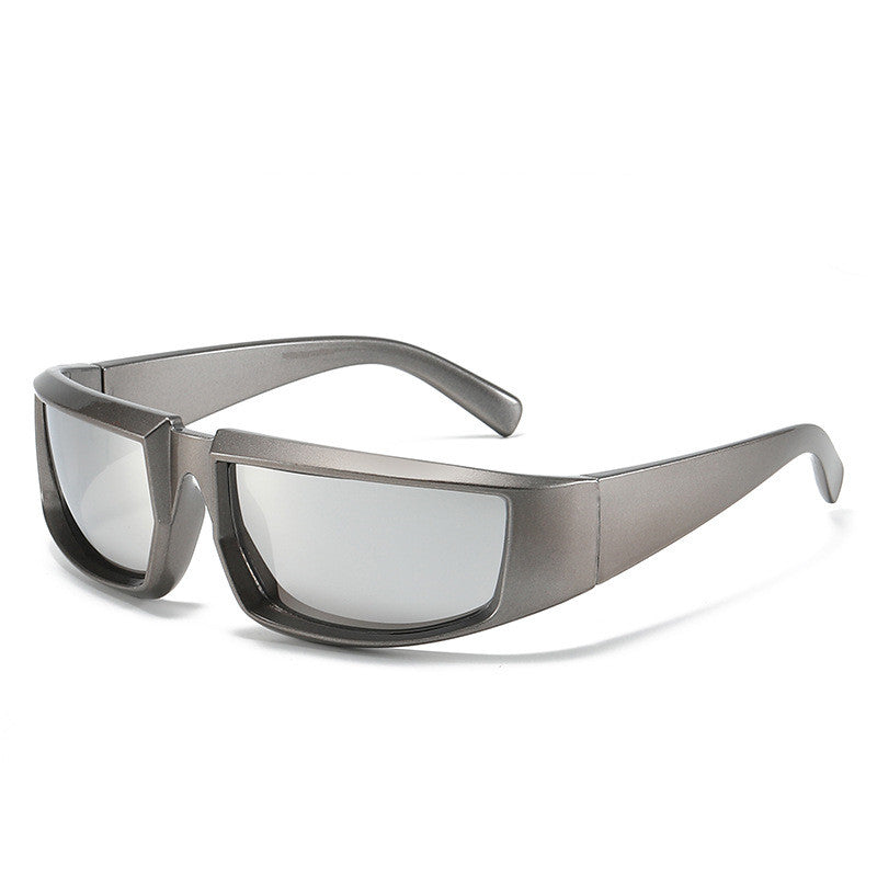 Metallic gray sports sunglasses with a wraparound frame and mirrored lenses in a modern, hip-hop aesthetic.