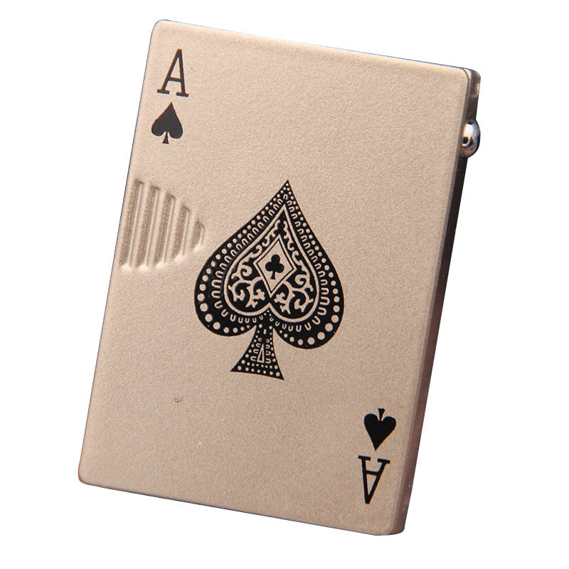 Metallic champagne-colored windproof lighter shaped like an Ace of Spades playing card with intricate black detailing.