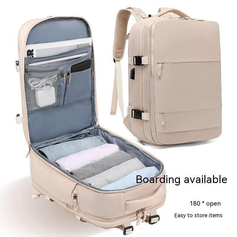 Beige waterproof travel backpack. Features 180-degree opening, organized internal pockets, and organized storage space.