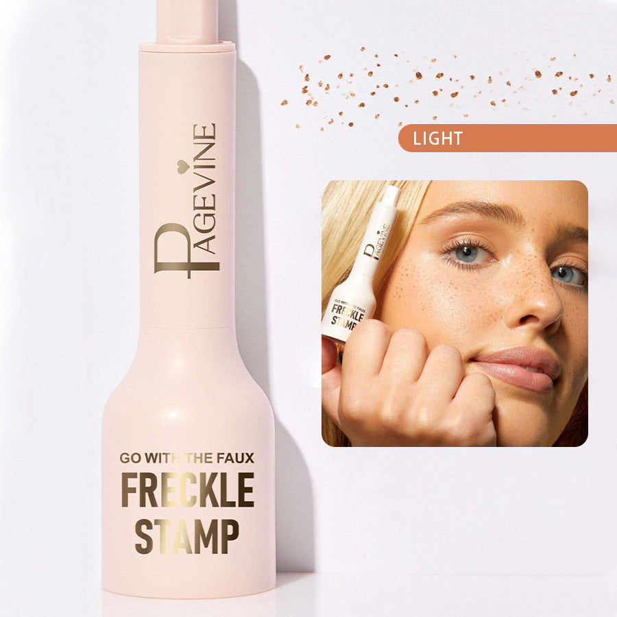 Light-pink Pagevine freckle stamp pen with gold lettering. Includes inset image of a model with natural-look freckles.