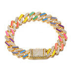 Gold hip hop Cuban chain featuring multicolored enamel links alternating with clear rhinestone-paved links and clasp.