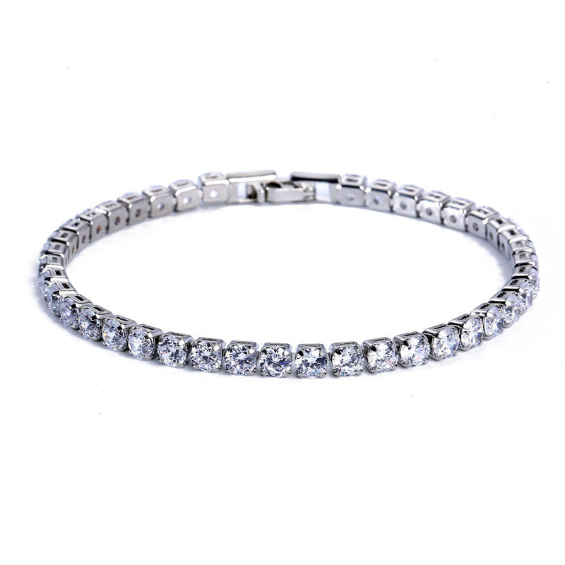 Silver-tone hip-hop tennis bracelet with micro-inlaid sparkling white zircon stones on a white background.