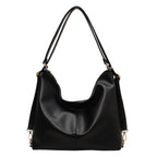 Elegant black PU leather slouchy shoulder bag with gold-tone hardware and a minimalist, vintage-inspired design.