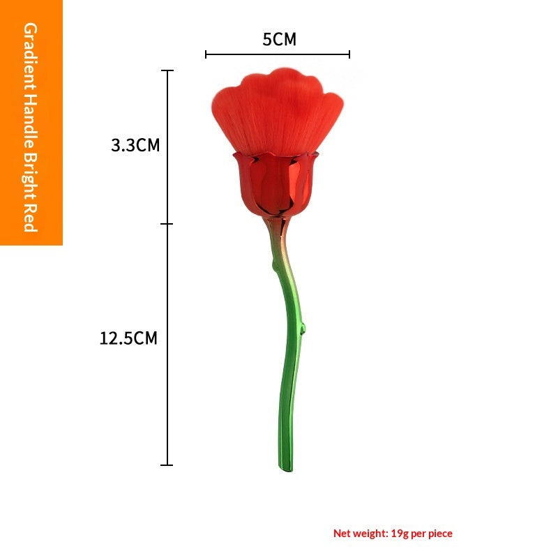 Red rose-shaped makeup brush with a gradient metallic stem, featuring soft bristles and labelled product dimensions.