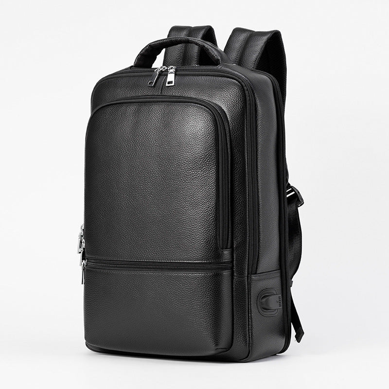 Black multifunctional leather business backpack with USB port, large capacity, and zippered compartments.