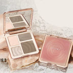 Judydoll all-in-one contour palette with matte shades and highlighter in a rose gold mirrored compact.