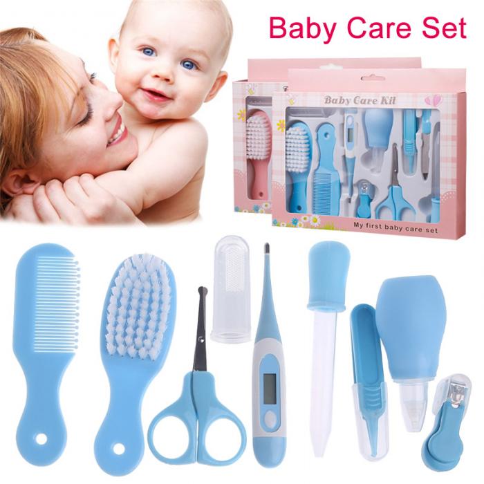 Blue portable baby grooming and health care set including comb, brush, scissors, thermometer, dropper, and nail clipper.