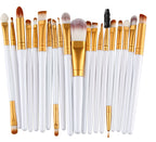 Digitaldistribution375 makeup set: 20 professional brushes with white handles, gold ferrules, and soft synthetic fibers.