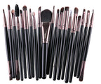 A set of Digitaldistribution375 makeup brushes with black handles, rose-gold ferrules, and various soft-bristled heads.