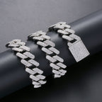 Silver hip-hop cuban link necklace covered in sparkling white zircon stones with a large, pavé-set square box clasp.
