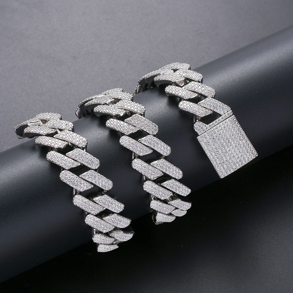 Silver hip-hop cuban link necklace covered in sparkling white zircon stones with a large, pavé-set square box clasp.