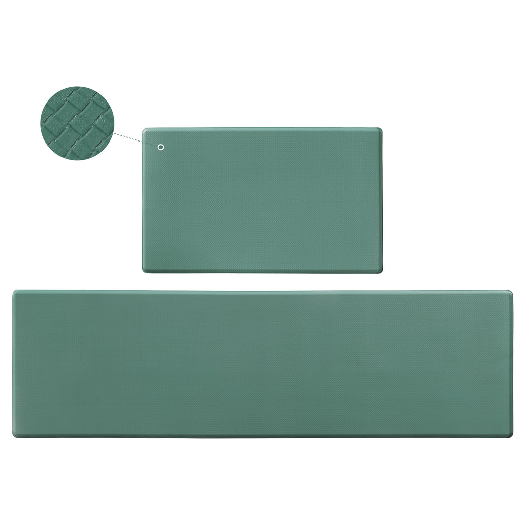 Two green, rectangular kitchen mats with a textured, waterproof surface and non-slip backing. Detail view included.