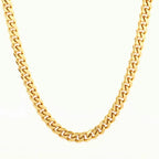 Gold-tone Cuban link chain necklace with a classic polished finish on a clean white background.