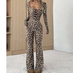 Women's slim-fit, long-sleeve leopard print jumpsuit featuring a square neckline and flared pant legs.