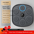 Wall-mounted black smart boxing target with five circular pads, LED display, Bluetooth connectivity, and red gloves.