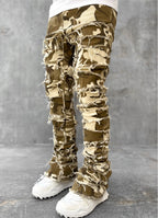 Men's camo-print stacked jeans featuring distressed, horizontal fringe rips and a tight, elongated fit.