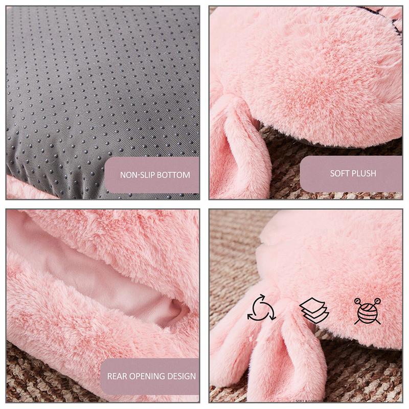 Pink plush USB shoe warmer features a soft, fuzzy texture, rear opening, and a gray non-slip dotted sole.