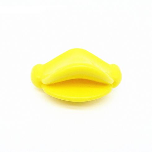 Bright yellow duck-bill shaped silicone baby pacifier, isolated on a white background.