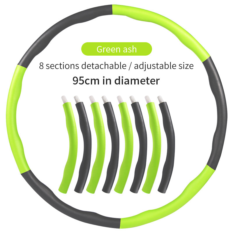 Detachable, 95cm foam-padded hula hoop in green and grey, consisting of 8 adjustable interlocking sections.