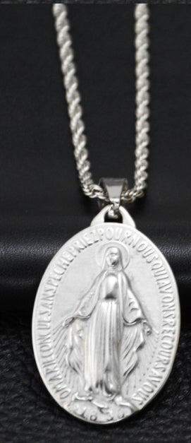 Silver-tone titanium steel necklace with an oval Miraculous Mary pendant on a twisted rope chain against black.